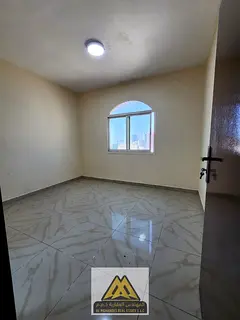 Apartment for annual rent in Al Nuaimiya 1 - Ajman, two bedrooms and a living room | balcony | centr