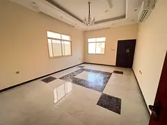 Villa for rent in Al Rawda, 5 master bedrooms with maid's room, living room and majlis