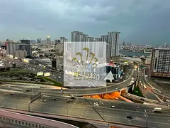 For Sale in Conqueror Tower Ajman: Ready 2BR Hall, Open City & Creek View, Freehold for All National