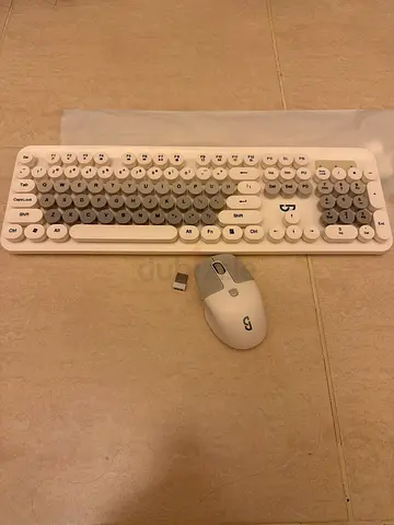 White wireless keyboard and mouse combo — compact round-key design
