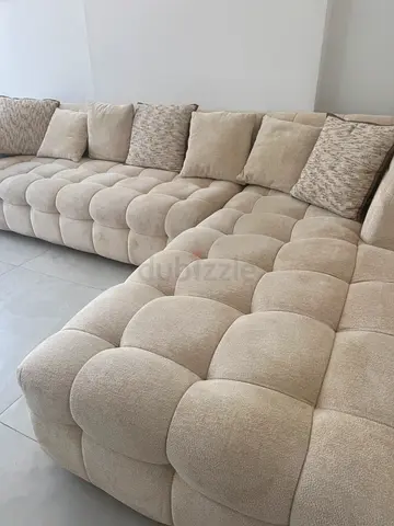Large Beige Tufted L-Shaped Sofa - Good Condition