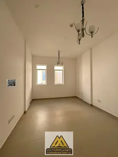 Annual Rent: Brand-new 1-bedroom apartment in Al Ameera Village, Al Yasmeen, master bedroom, 2 bathr