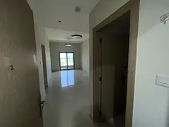 One bedroom and living room, two bathrooms with showers, built-in wardrobes, and a balcony with an o