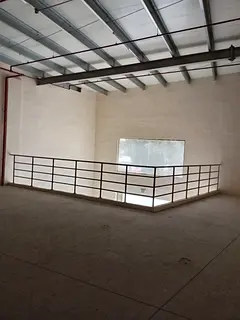 Warehouse in Al Jurf Industrial Area with a total area of 4,400 sq. ft., including a mezzanine, and