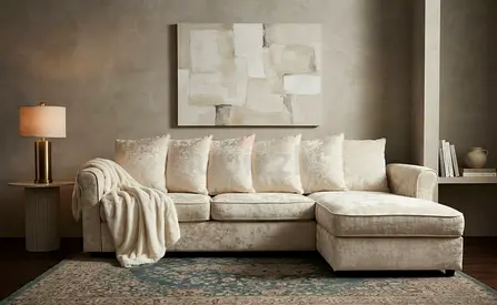 Comfortable Cream L Shape Sofa Bed featuring a soft sleeping mattress, spacious storage, and elegant