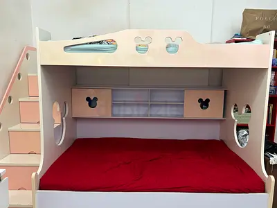 Pink wooden bunk bed with storage and staircase - 3 levels