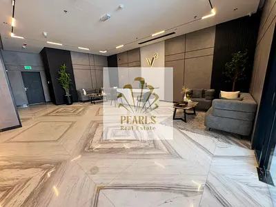 Luxury brand-new 1BR master apartment in Al Jurf 3, 2 baths, balcony, central A/C, spacious layout, modern finishes, prime location near all services.