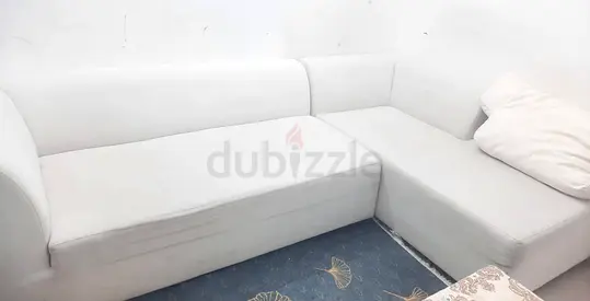 Light grey L-shaped sofa - simple modern design, good condition