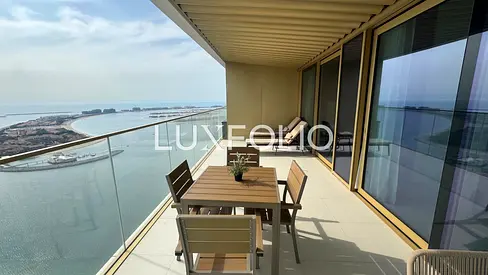 PRICED REDUCED | PALM & SUNSET VIEW | ONE OF THE HIGHEST FLOORS