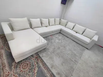 The one brand off white color Ushaped sofa