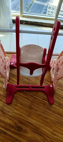 Kids indoor swing with seat - sturdy plastic toddler swing (used)