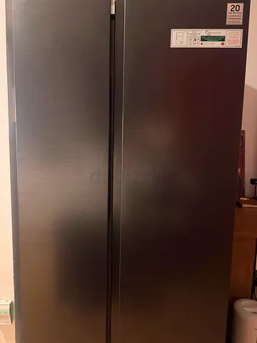 Samsung Side-by-side stainless steel refrigerator - good condition