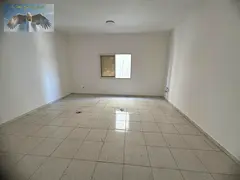 For annual rent in Al Rashidiya 3 Ajman a studio apartment with a separate kitchen The building is c