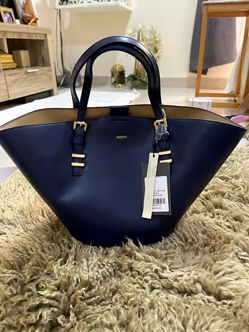 Genuine navy leather tote bag with tags - stylish everyday carry