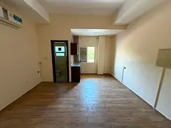 Annual Studio for Rent | Semi-Separate Kitchen | Prime Location in Al Mowaihat 20