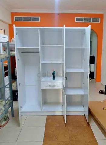 White 3-Door Wardrobe with Shelves and Drawer - Good Condition