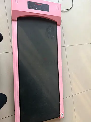 Compact pink foldable treadmill — light use
