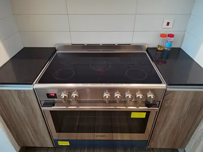 Bosch series 8  stainless steel electric cooker with glass hob and oven