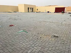 Industrial Yard full interlock For rent direct from owner - al Sajaa