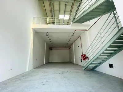 The warehouse is located on a main street within Al Jurf Industrial Area 3—one of the most active and vibrant industrial zones—and benefits from easy