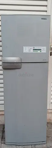 Double door Toshiba Refrigerator,  condition is perfect working,  color silver