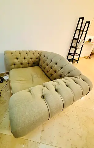 Light grey tufted corner sofa — give away