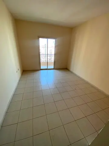 Two bedroom apartment for annual rent in Al Taawun with a balcony, two bathrooms, and built in wardrobes. Rent AED 44000 yearly. Payment in 4 or 6 ins
