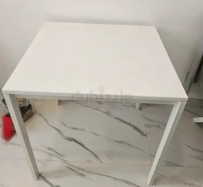 Simple white square dining table - good condition with 4 chairs