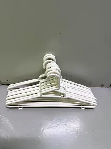 Set of white metal clothes hangers - 10 pieces