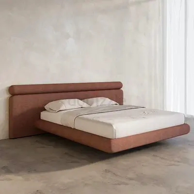 Modern low-profile upholstered double bed with padded headboard