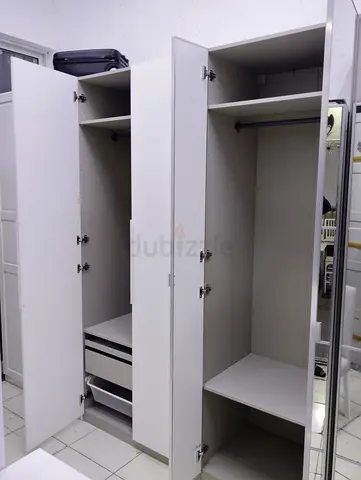 White 4-Door Wardrobe / Armoire with Shelves and Hanging Rail