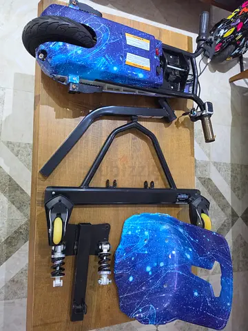 Electric scooter conversion kart attachment with seat and shock absorbers (blue galaxy)