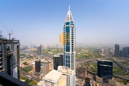 High Floor | Semi-Furnished | with huge Balcony