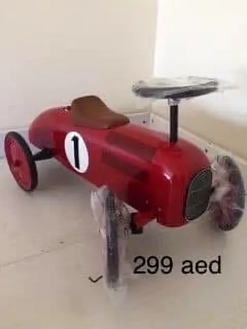 Red Vintage-Style Ride-On Pedal Car for Kids