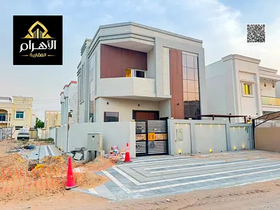 Corner villa for sale in Al Yasmin | 5 master bedrooms | Close to all services | Freehold | Includes air conditioning | No service charges