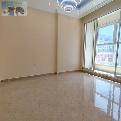 Spacious 2 bedroom apartment for annual rent in Ajman with 2 bathrooms, balcony, private parking,family-friendly building,and flexible payment options