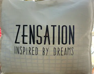 This Zensation branded mattress topper features Coolmax technology designed to regulate temperature