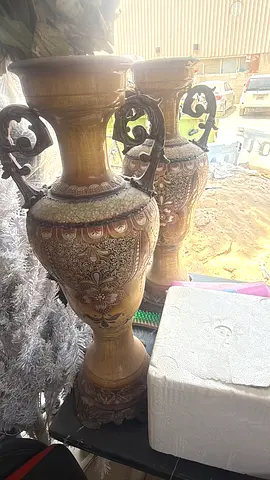 Pair of large ornate wooden decorative vases