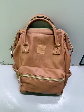 Light brown leather-look backpack — very light used