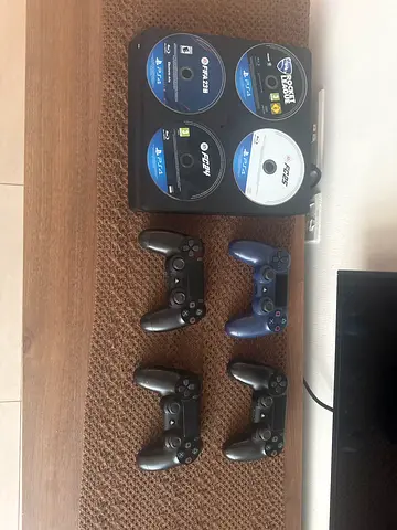 PS4 for sale need gone asap with 4 controllers 3 need fixing in charging port with games