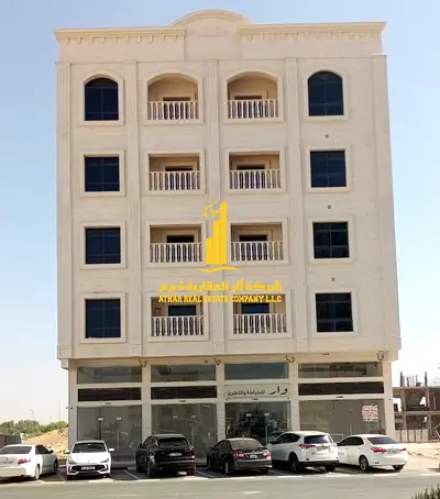 Distinctive residential and commercial building (ground floor + 4 floors) with high rental yield, near Sheikh Zayed Road