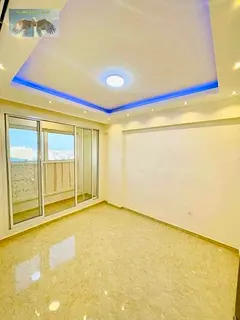 For annual rent in Ajman a three-bedroom apartment with a living room in Al Rawda 3 featuring a spac