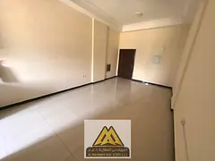Spacious Ground Floor Studio with Central AC & Semi-Closed Kitchen for Annual Rent - Al Mowaihat 1,