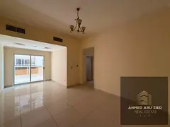 Two bedrooms and a living room for annual rent in Al Nuaimiya 1, Ajman, next to Al Hikma School. Fea