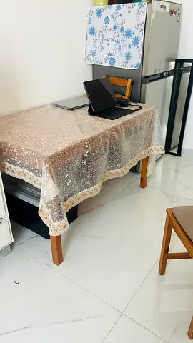 Wooden dining table with 4 chairs — good condition