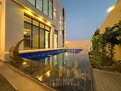 Own a luxurious villa with a modern design and high-end personal finishes in the Al Zahiyah area of