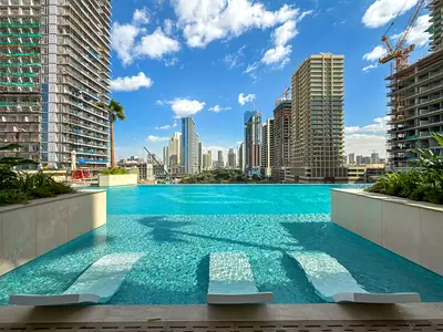 Chic 1BR Retreat w/ Private Pool & Balcony in JVC