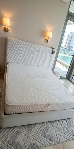 Queen upholstered bed frame with mattress - modern white, excellent condition