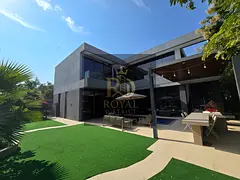 Luxury 4BR standalone villa with elegant majlis, private pool, premium furnishings, modern design, a