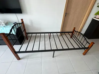 Single metal bed frame with wooden posts - sturdy used